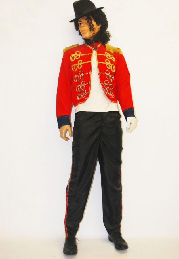 Mannequin in a themed costume with red jacket and black pants