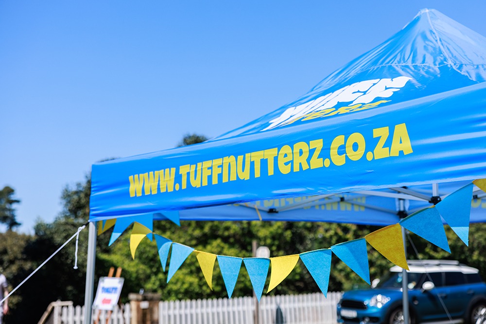 Tuff Nutterz branded tent with colourful bunting