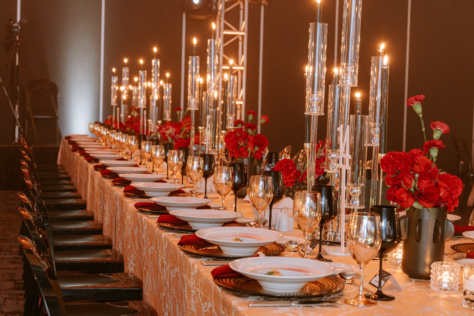 Long table elegantly set with flowers and tableware