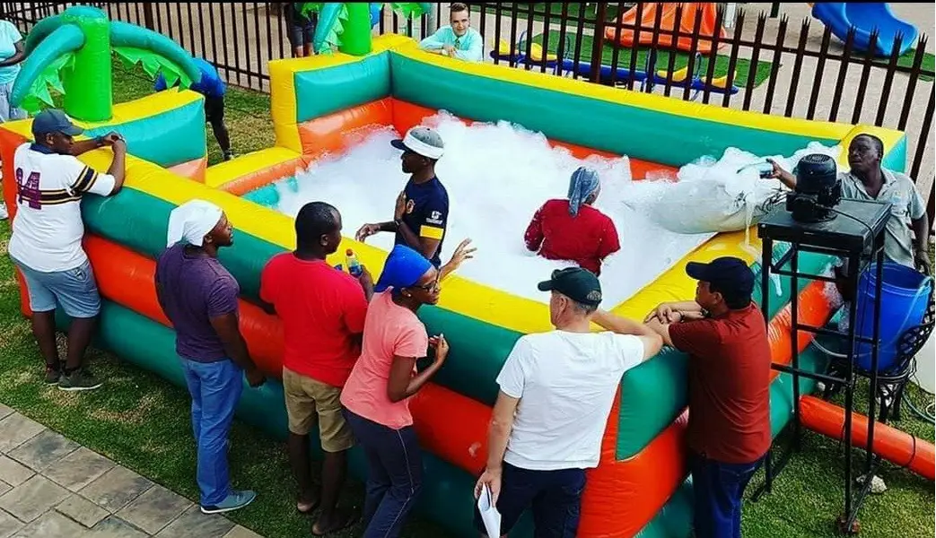 Colorful dunk tank setup at an outdoor event