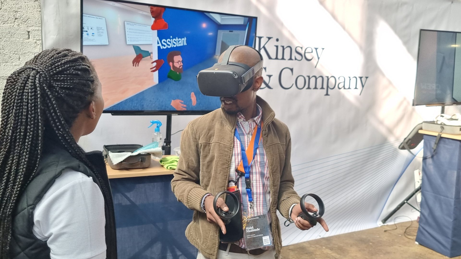 Person enjoying a virtual reality experience with VR headset and controllers