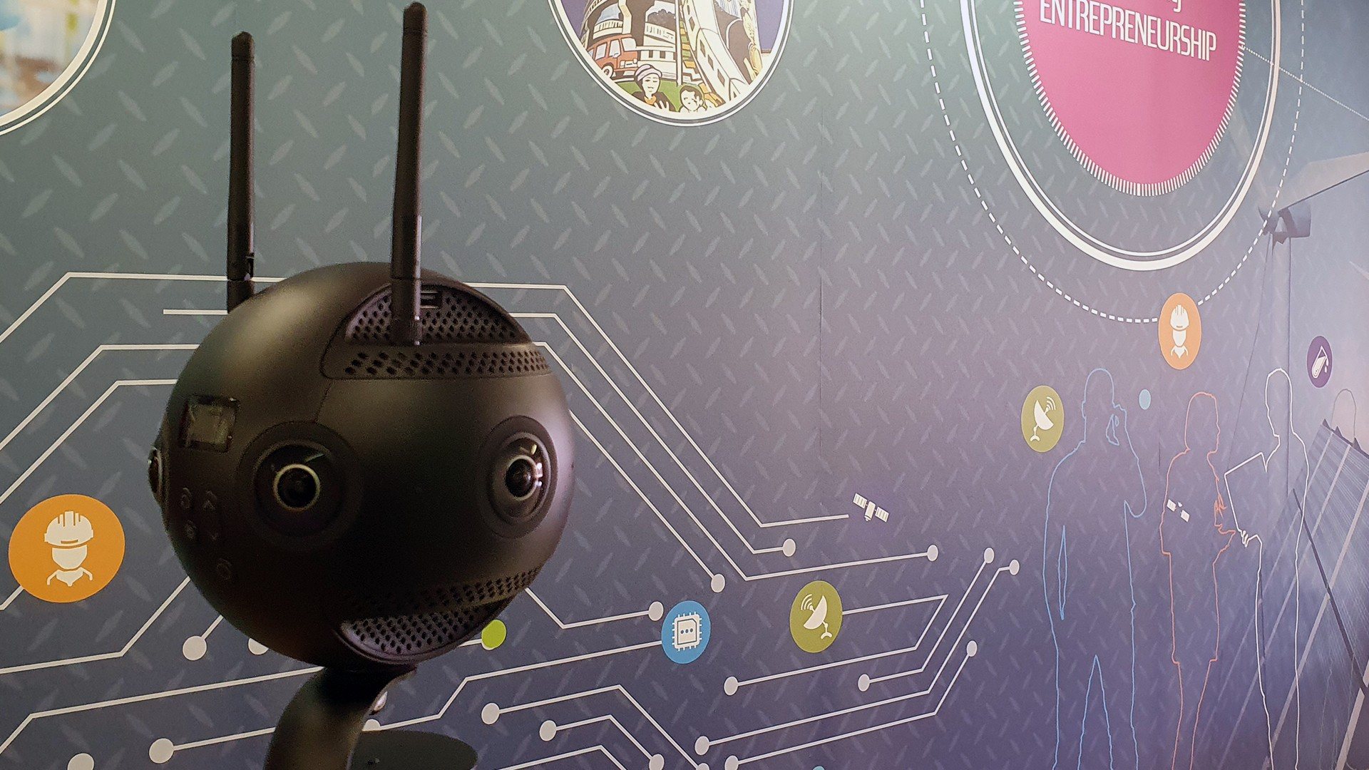 Virtual reality camera setup against a themed wall
