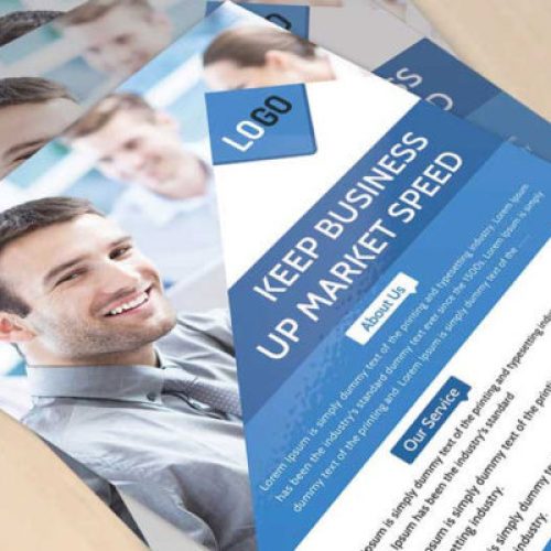 Close-up of vibrant promotional flyers with business messages.