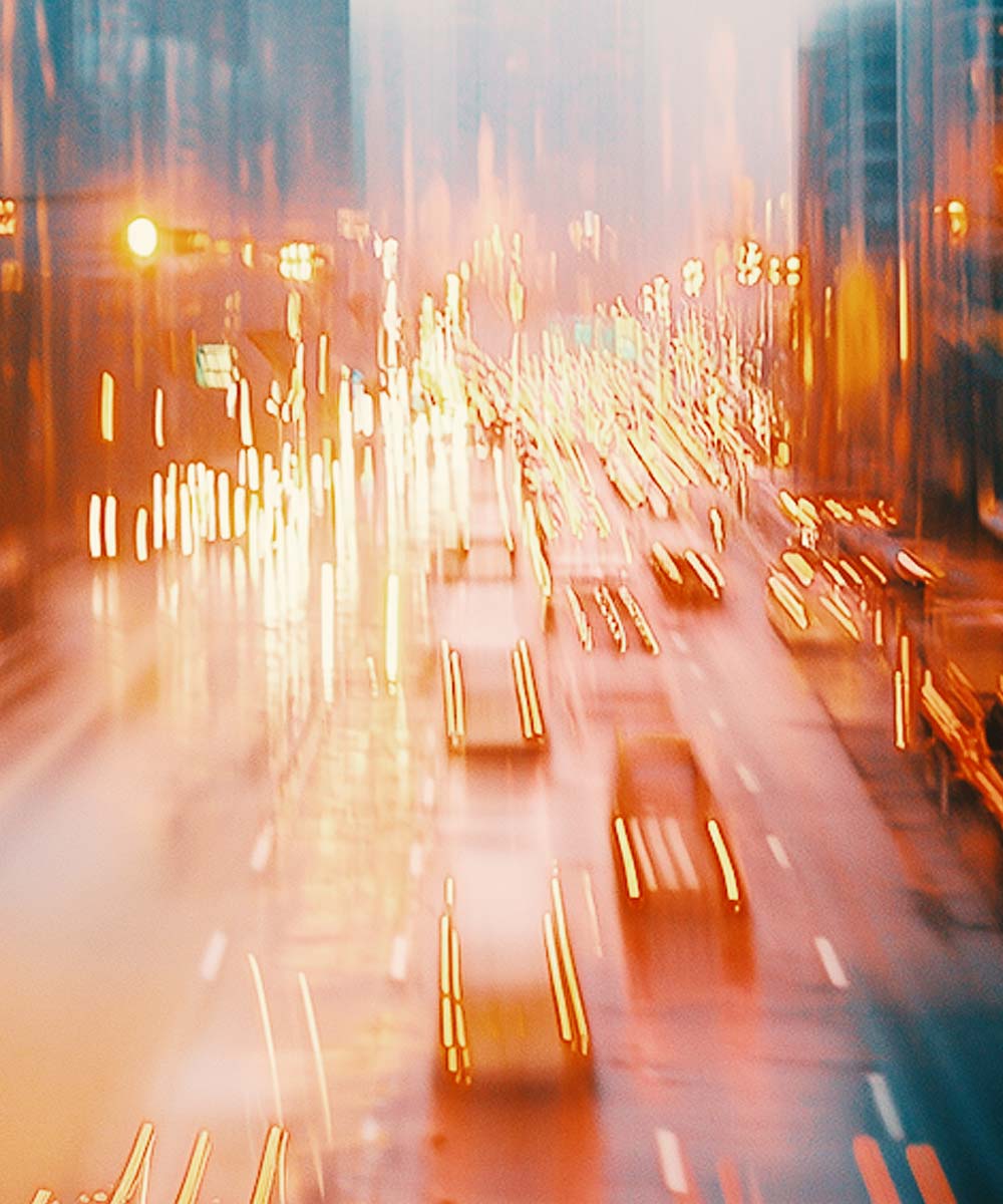 Blurred city traffic scene at dusk
