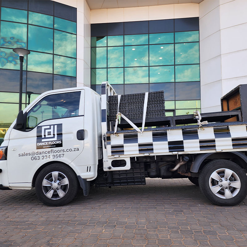 Delivery vehicle for dance floor arranged for event