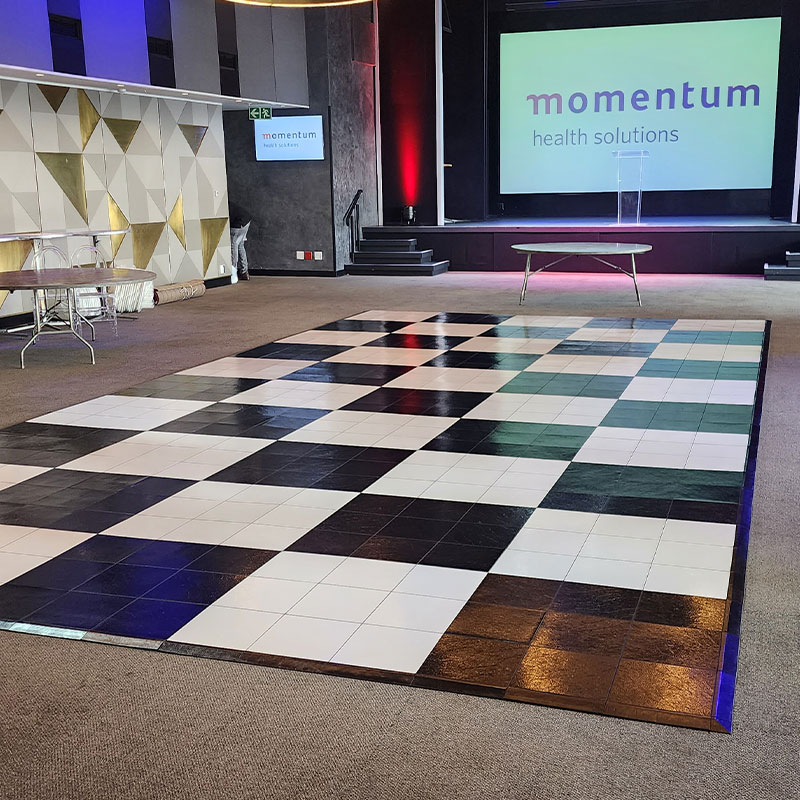 Black and white checkerboard dance floor in event space