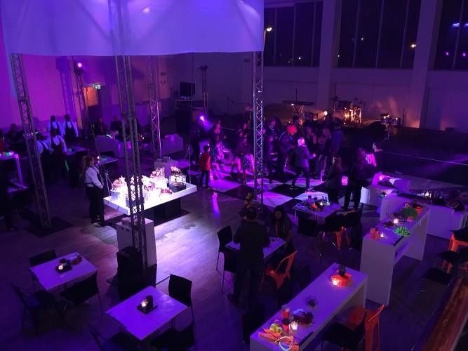 Event space with adaptable flooring and lighting setup