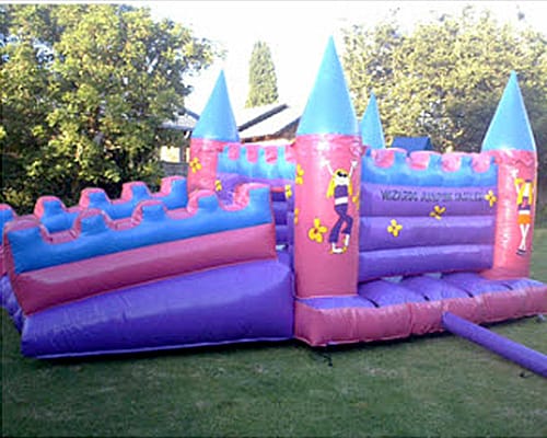Pink and purple princess-themed jumping castle